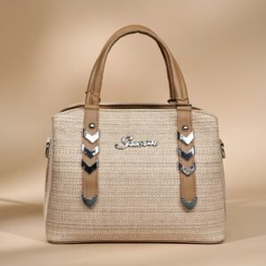 beige women's handbag with decorative straps.