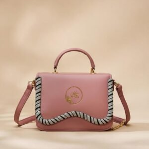 pink faux-leather crossbody bag with a top handle and a twisted rope-style trim.