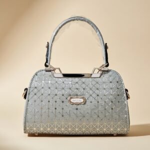 grey top-handle handbag with a geometric pattern and a kiss-lock closure.