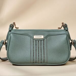 green faux leather women's sling or cross-body bag.