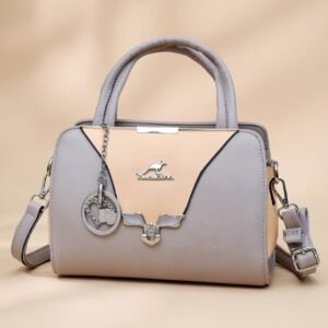 Kangaroo" brand two-tone (grey and beige) faux leather satchel handbag with a removable shoulder strap.