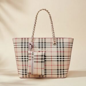 Burberry Medium Reversible Bloomsbury Tote in the classic Nova Check coated canvas with a chain strap.