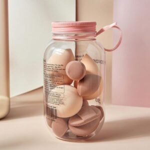 makeup blender sponges and powder puffs in a storage jar.