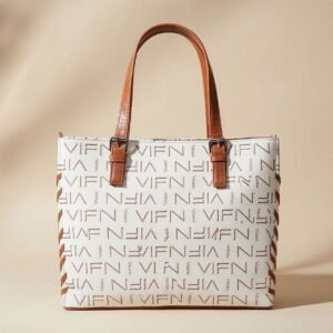 white and brown tote bag with a repeating logo pattern and brown leather-look handles.