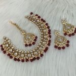 gold-plated Kundan and pearl maroon traditional choker necklace set