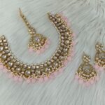 gold-plated Kundan and pearl maroon traditional choker necklace set