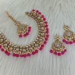 gold-plated Kundan and pearl maroon traditional choker necklace set