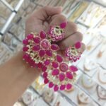 earrings are traditional Indian Kundan and pearl chandbali earrings