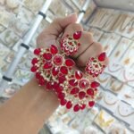 earrings are traditional Indian Kundan and pearl chandbali earrings