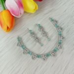 American Diamond or Cubic Zirconia studded necklace set featuring a silver-plated finish. (