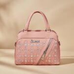 Guess women's pink logo print satchel handbag purse crossbody bag.