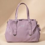 purple women's handbag, possibly made of non-leather material.