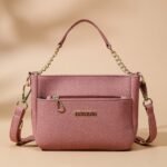 pink faux leather top-handle shoulder crossbody bag.