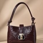 Shoulder Bag Series 1, a brown woven-look bag with a pleated front and gold-tone hardware. 490.00৳