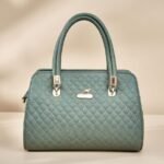 quilted green women's handbag.