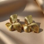 ribbed gold-tone petals arranged