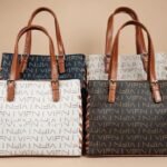 tote bags with a repeating "VIFN" logo pattern.