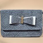 metallic grey clutch bag.