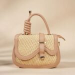 straw-woven crossbody handbag.