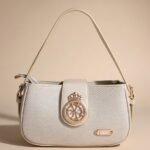 small white or beige handbag.