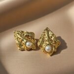 earrings appear to be similar to the niche luxury geometric flower