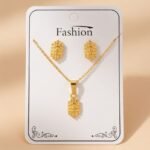 gold-plated chain necklace and matching stud earrings,