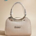 Guess Canaria mid-size satchel crossbody bag in a stone (beige) color and faux pebbled leather material.