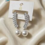 earrings are a pair of Long Marquise Cubic